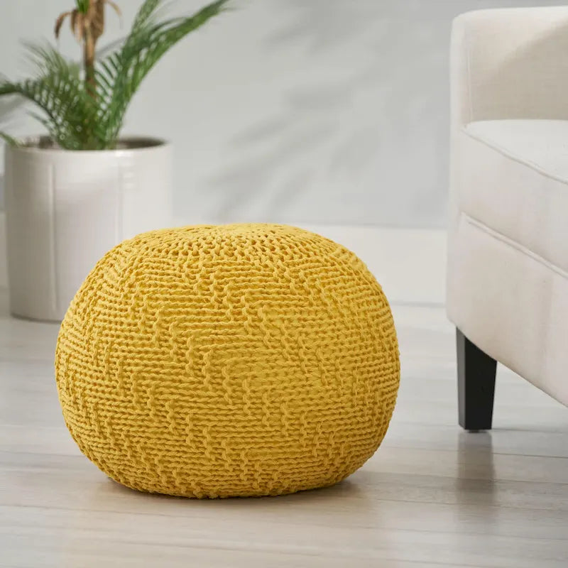 Pouf rotondo in cotone lavorato a maglia con motivo a trecce, imbottitura in perle di polistirolo