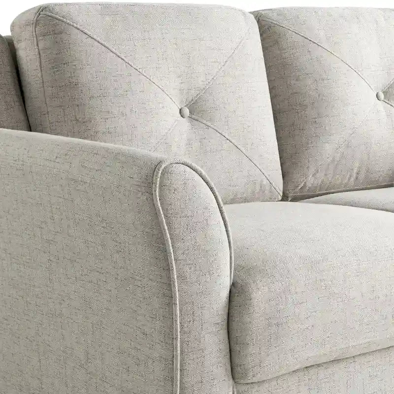 Poltrona d'accento rivestita in microfibra con schienale trapuntato e struttura in legno di eucalipto