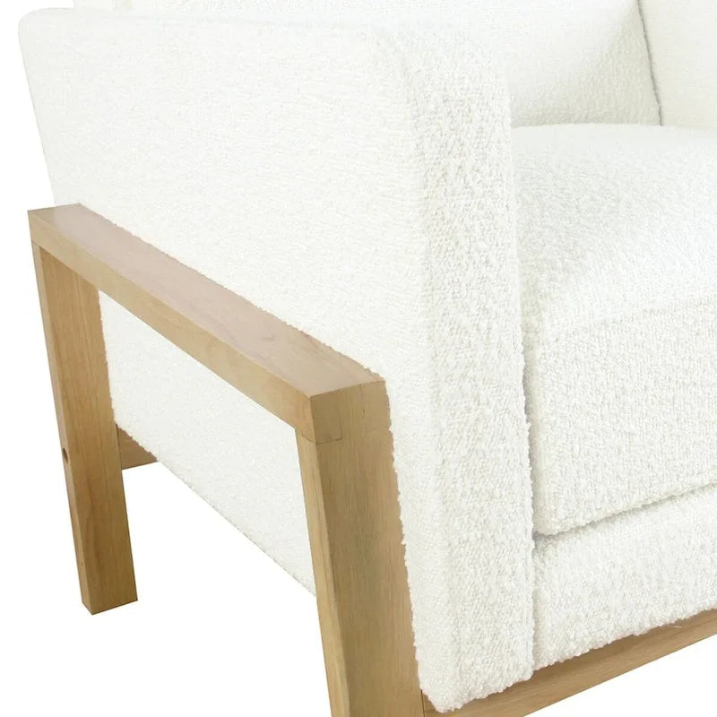 Sedia accento moderna con struttura in legno, tessuto bouclé crema e sedile a molle sinuose