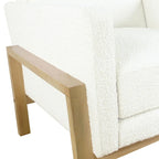 Sedia accento moderna con struttura in legno, tessuto bouclé crema e sedile a molle sinuose