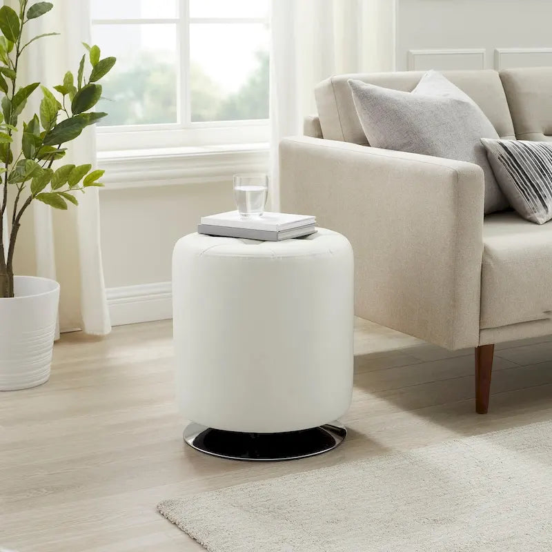 Pouf girevole in similpelle con piano rotondo trapuntato e base in acciaio