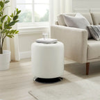Pouf girevole in similpelle con piano rotondo trapuntato e base in acciaio