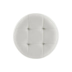 Pouf girevole in similpelle con piano rotondo trapuntato e base in acciaio