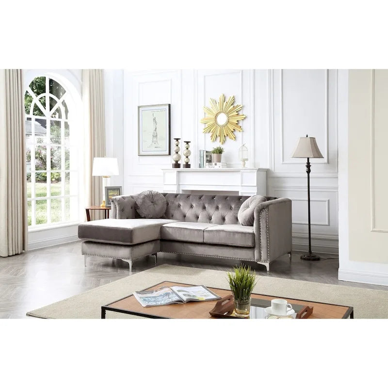 Divano in velluto trapuntato con chaise longue per salotto moderno