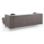 Divano in velluto trapuntato con chaise longue per salotto moderno